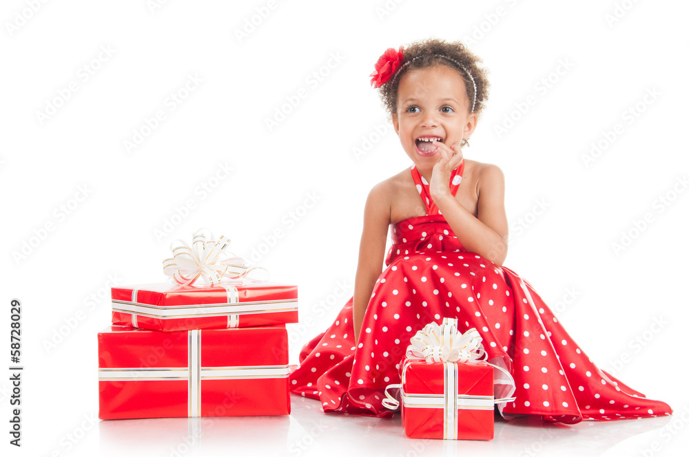 Happy little girl with a gift in hands. Happy little girl with a gift in hands.