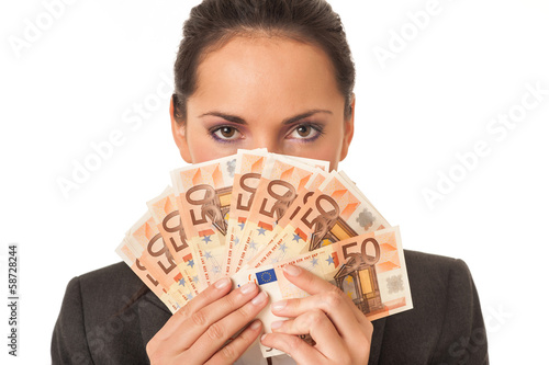 Businesswoman holding euro banknotes hiding herself on white bac