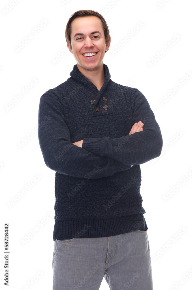Attractive young man smiling with arms crossed Attractive young man smiling with arms crossed