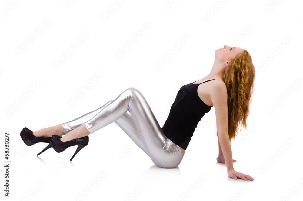 Young redhead girl in tight leggings Stock Photo