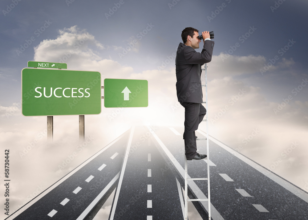 Composite image of businessman standing on ladder Composite image of businessman standing on ladder