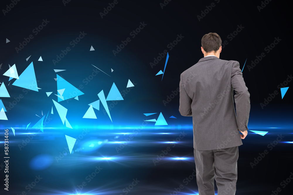 Composite image of young businessman walking away from camera Composite image of young businessman walking away from camera