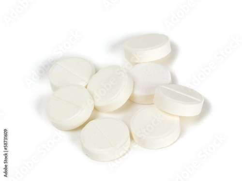white pills isolated on white