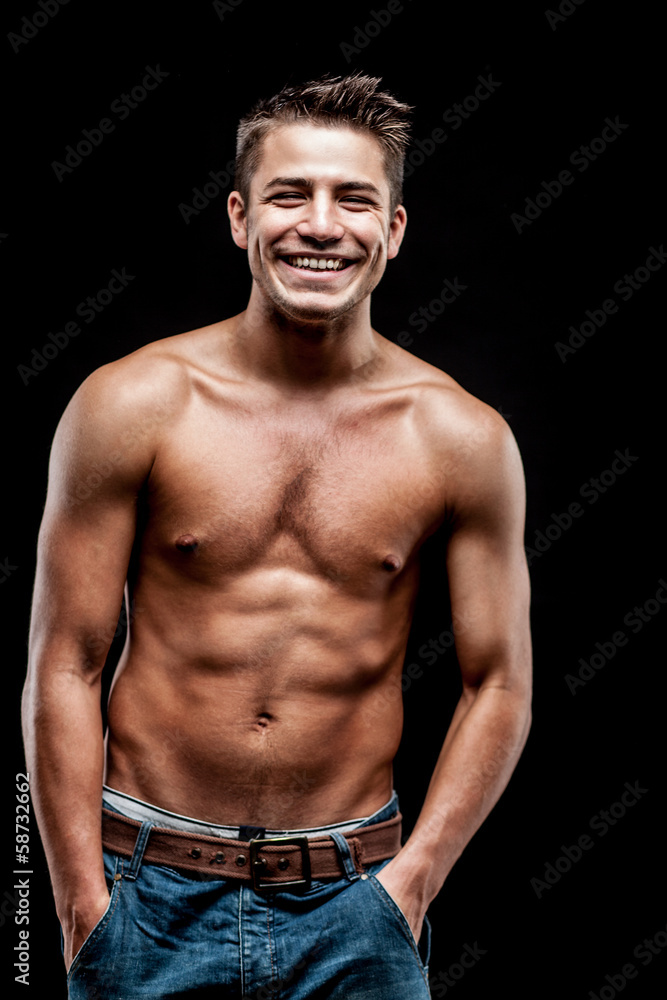Fototapeta premium young man on dark background