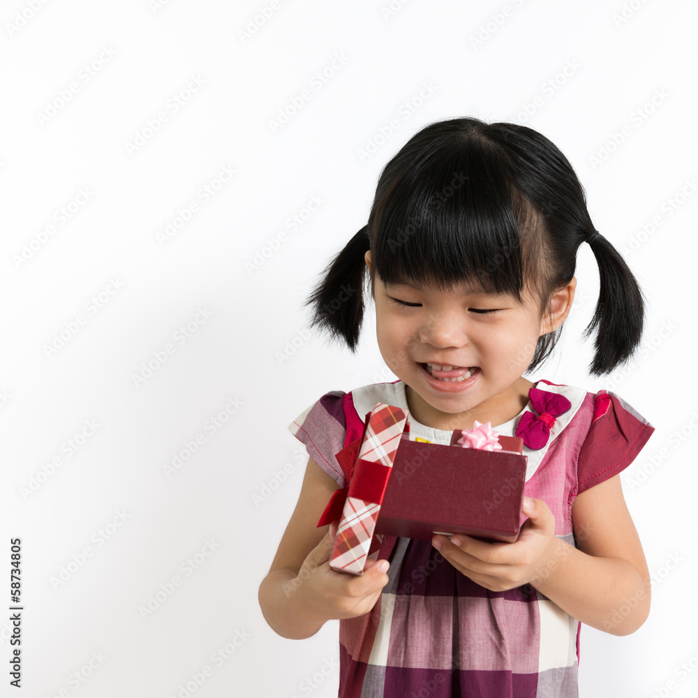 Little child with gift box