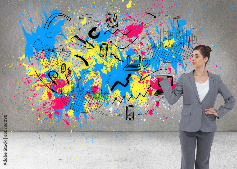 Composite image of businesswoman holding tablet computer Composite image of businesswoman holding tablet computer
