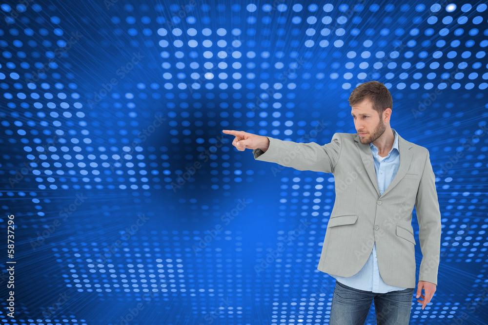 Composite image of trendy model pointing to something Composite image of trendy model pointing to something