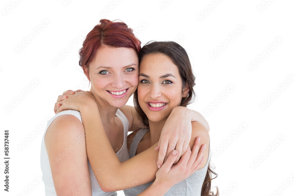 Close-up portrait of a young female embracing her friend Close-up portrait of a young female embracing her friend