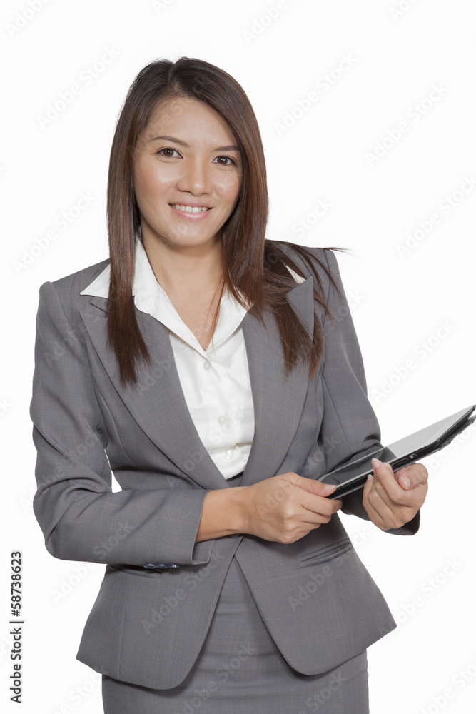 Businesswomen in office attractive young using tablet Businesswomen in office attractive young using tablet