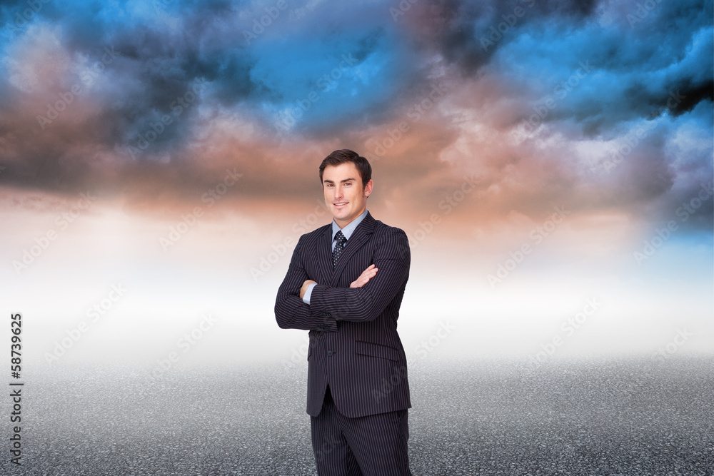 Composite image of young businessman standing cross-armed Composite image of young businessman standing cross-armed