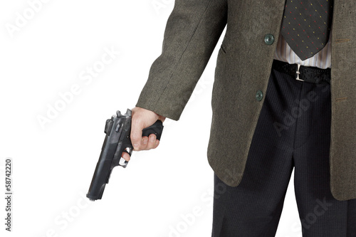 Man holds a pistol in his hand