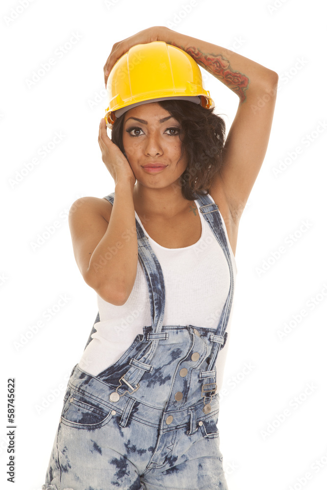 woman overalls shorts hard hat on