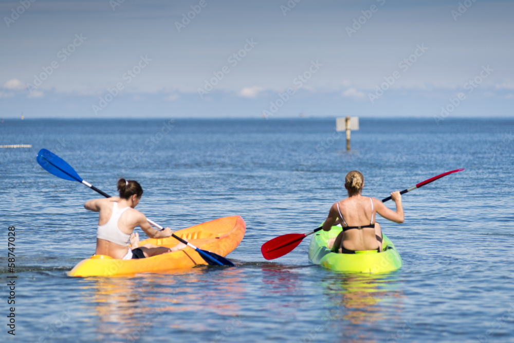 Two people on sea kayak