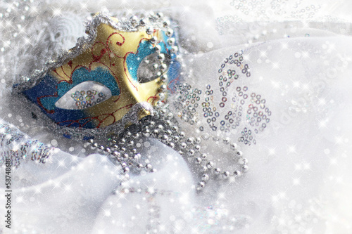 Christmas background with mask and candle
