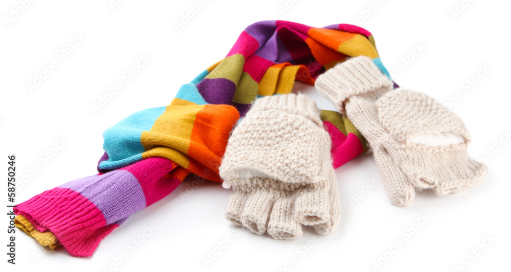 Wool fingerless gloves and multicolor scarf, isolated on white Wool fingerless gloves and multicolor scarf, isolated on white