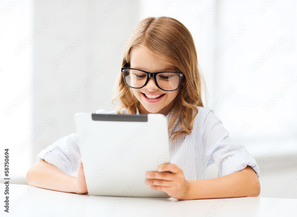 smiling girl in glasses with tablet pc at school smiling girl in glasses with tablet pc at school
