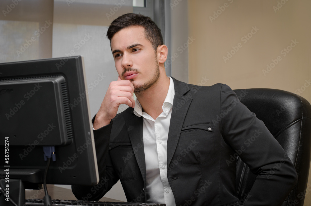 Preoccupied, worried young male office worker Preoccupied, worried young male office worker