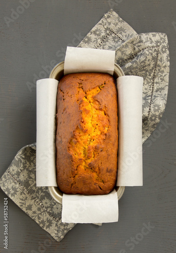 Freshly baked homemade banana bread with pumpkin and pecan. photo