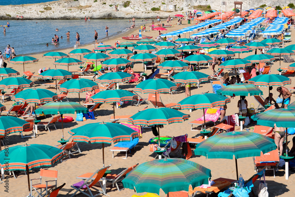 Crowded beach with umbrellas, Vieste, Apulia, Gargano,Italy