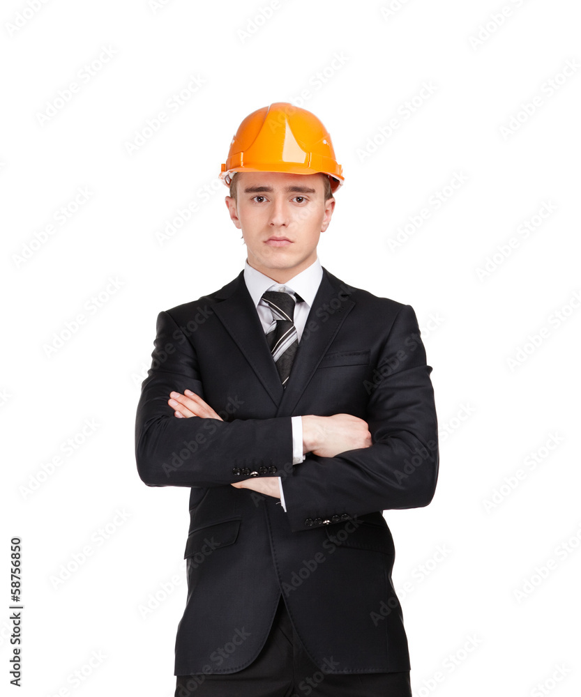 Portrait of businessman with arms crossed in helmet Portrait of businessman with arms crossed in helmet