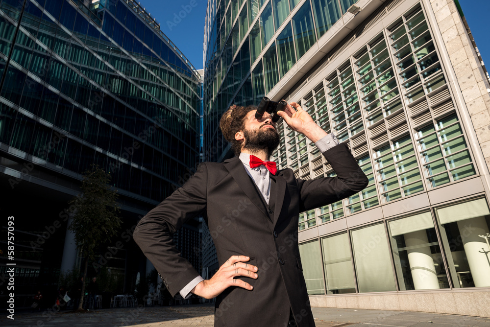 Stylish elegant dreadlocks businessman binoculars