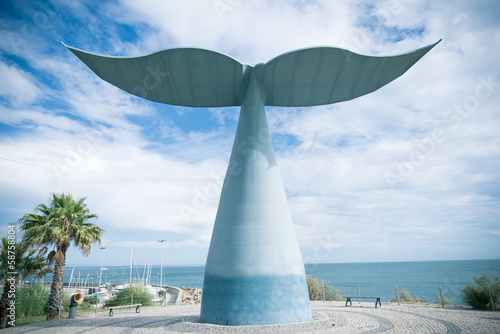 Sculpture whale tail photo