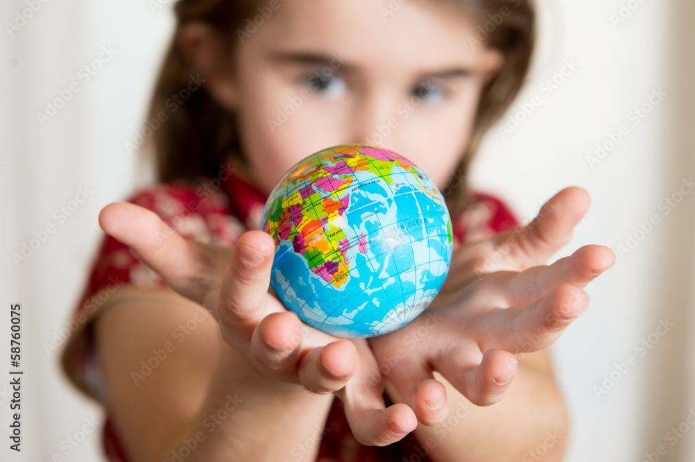 Cute lgirl holding little World Globe on her Hands Cute lgirl holding little World Globe on her Hands