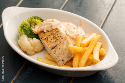 chicken breast with french fries