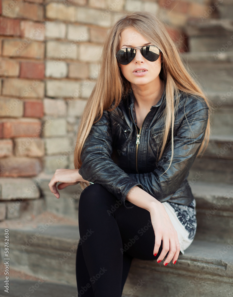 Beautiful and fashion girl in sunglasses, close-up portrait Beautiful and fashion girl in sunglasses, close-up portrait
