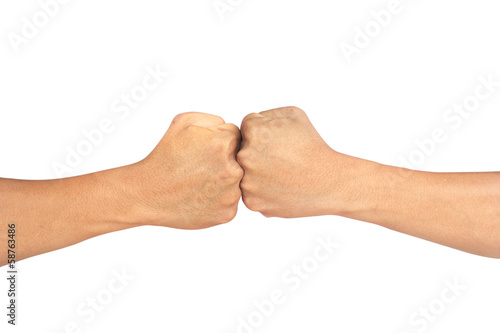 A close up image of a fist bump against white background
