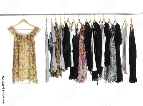 Variety of casual fashion clothing on hangers © vuvu102