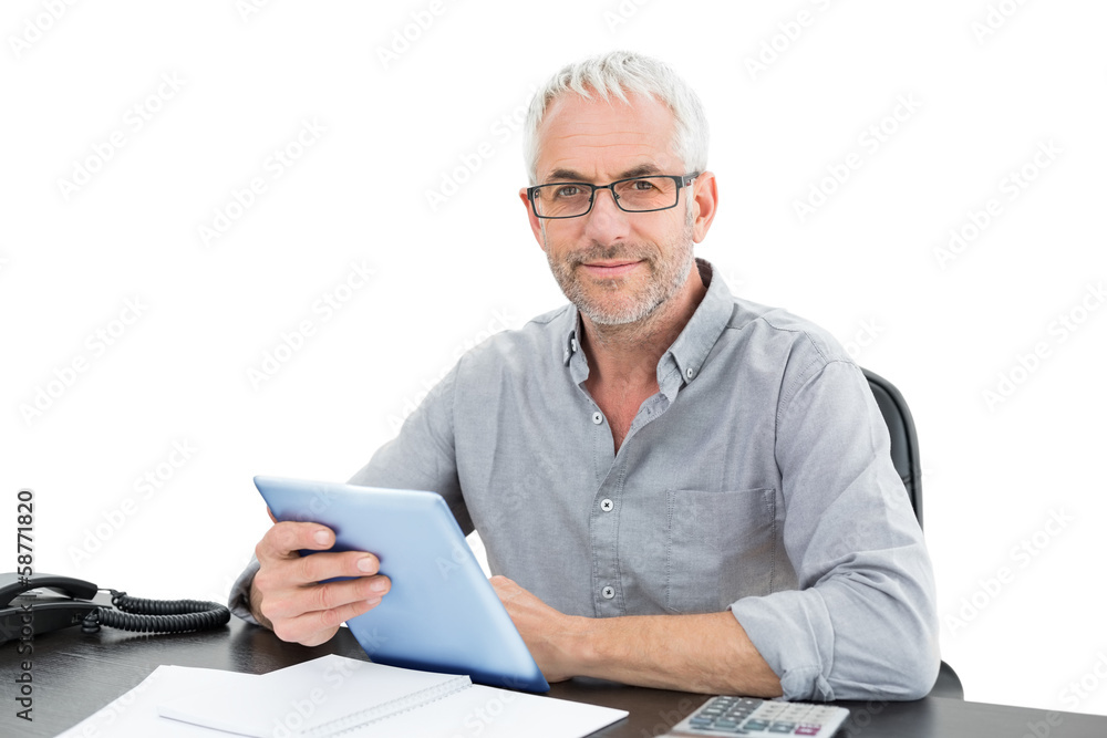Portrait of a mature businessman with digital tablet and telepho Portrait of a mature businessman with digital tablet and telepho