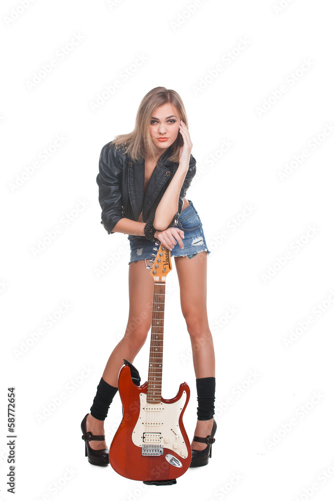 Young woman with guitar on white background Young woman with guitar on white background