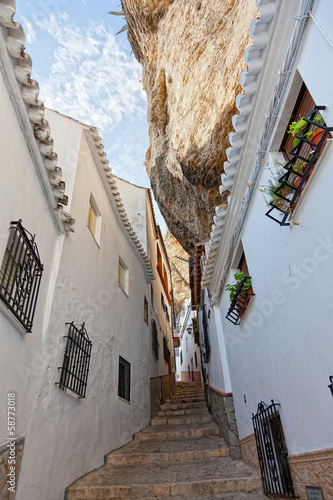  view of street between rocks in Setenil de las Bodegas, Spain photo