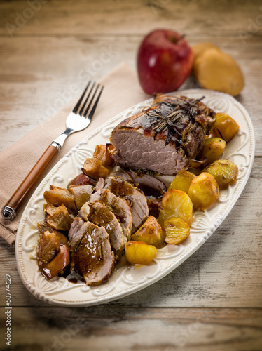 roast with potatoes and apple, selective focus