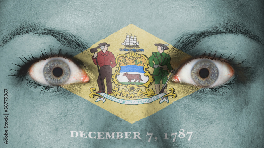 Naklejka premium Close up of eyes with flag