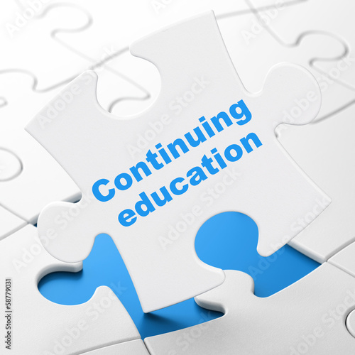 Education concept: Continuing Education on puzzle background