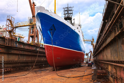 Slika na platnu Cargo ship is being renovated in shipyard Gdansk, Poland.