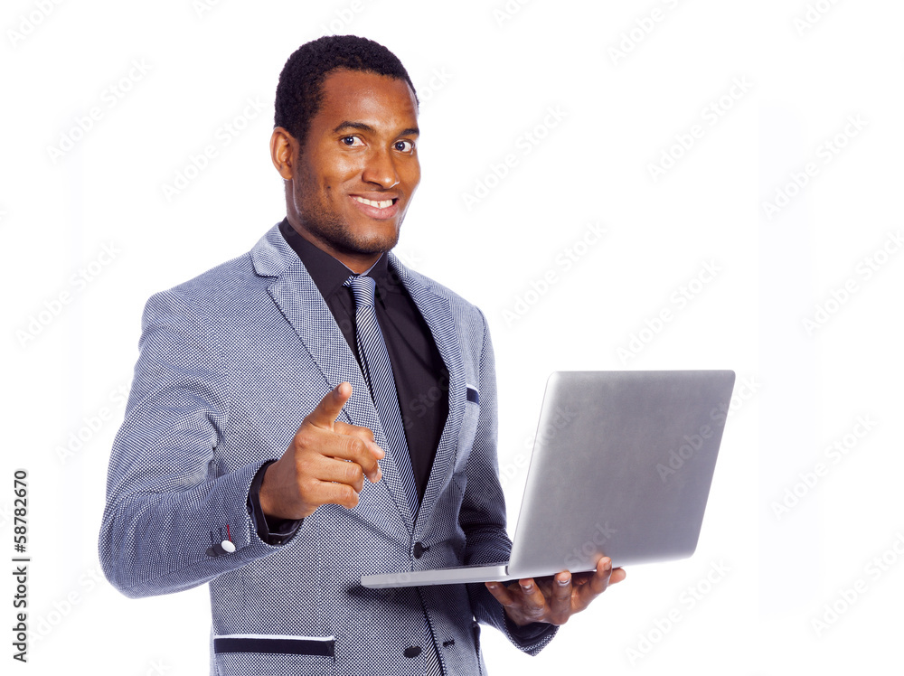 Portrait of a smiling business man holding a laptop, isolated ov Portrait of a smiling business man holding a laptop, isolated ov
