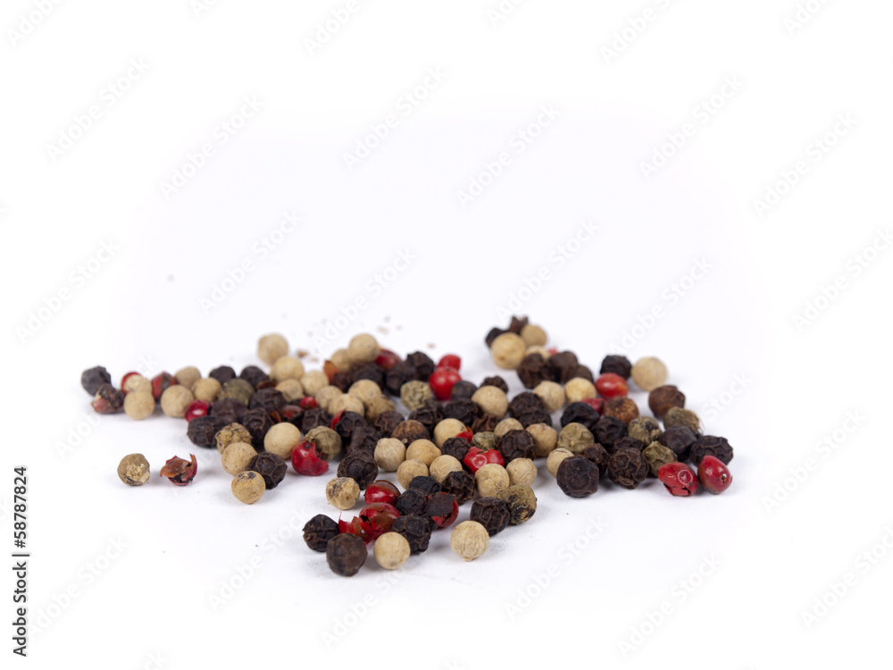 Pile of peppercorn isolated over white Pile of peppercorn isolated over white