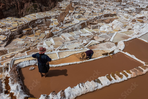 women Maras salt mines peruvian Andes Cuzco Peru