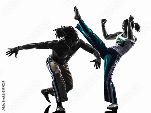 couple capoiera dancers dancing   silhouette
