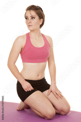 woman pink sports bra shorts knel look back © Poulsons Photography