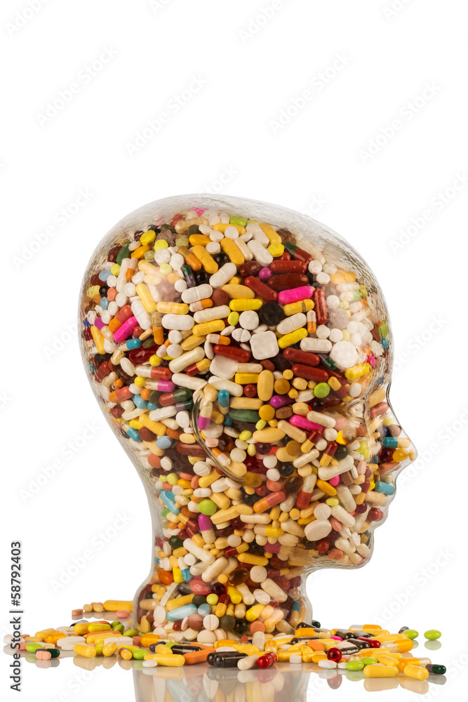 Kopf aus Glas mit Tabletten