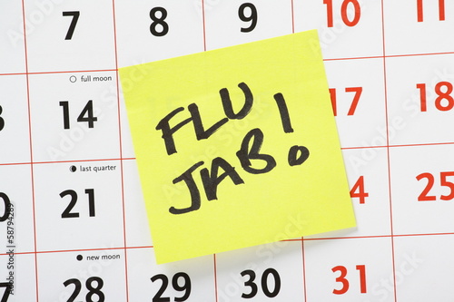 Flu Jab Reminder on a wall calendar photo