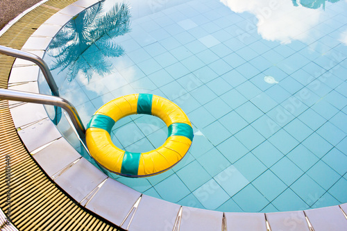 Life preserver floating in a  swimming pool
