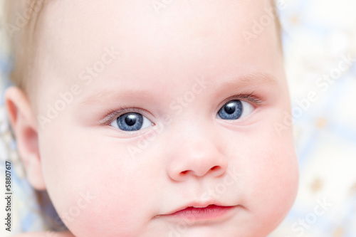 Six months old baby closeup portrait