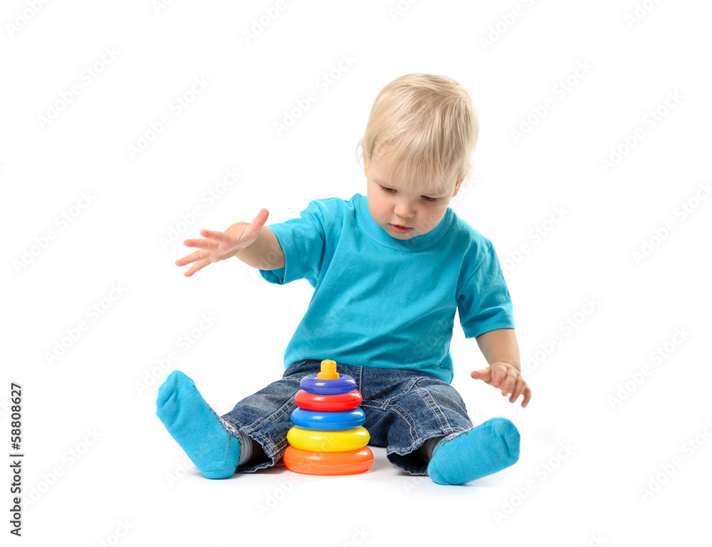 Cute kid girl playing with educational toy Cute kid girl playing with educational toy