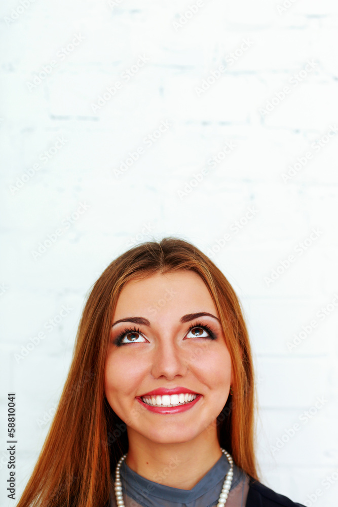 Portrait of a young beautiful happy woman 