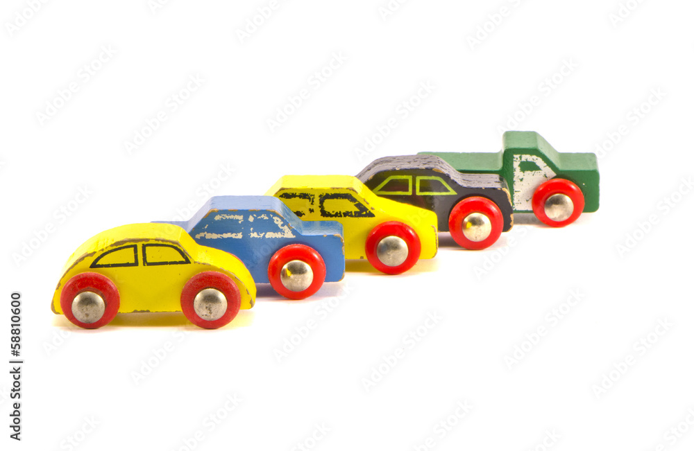 five old retro toy cars isolated on white background five old retro toy cars isolated on white background